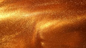 Gold liquid with tints of golden glitters. Yellow background with a scattering of gold sparkles. Magic Galaxy of golden dust particles in fluid.  - Powered by Shutterstock - Get 15% off with code: PIKWIZARD15