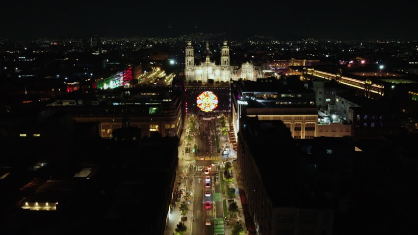 Aztec calendar led sign in the mexico zocalo street, downtown drone view. Celebrating the Mexican Independence Day and the 5 mayo.