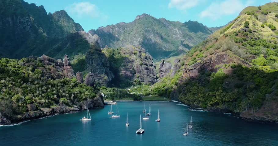 Timelapse of Clouds Moving and Light Changing over Tropical Green Mountains in Bay of Virgins Fatu Hiva Island Marquesas French Polynesia in South Pacific Ocean