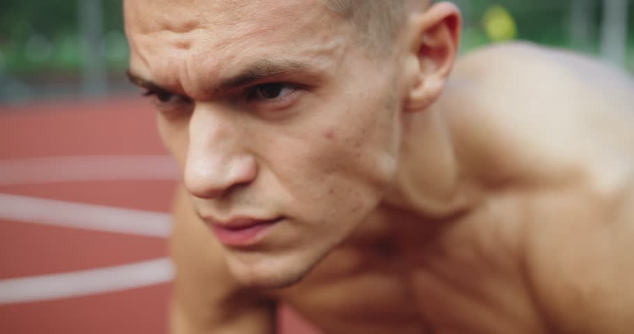Serious portrait of tired athlete man, breath and resting after hard intense workout outdoors, closeup. Face of sporty male after endurance exercise. Fitness and training challenge concept Royalty-Free Stock Footage #1108489021