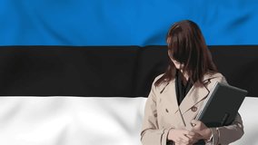 Stylish girl holds a laptop in her hands with waving flag of Estonia in background. 3d animation in 4k resolution video.