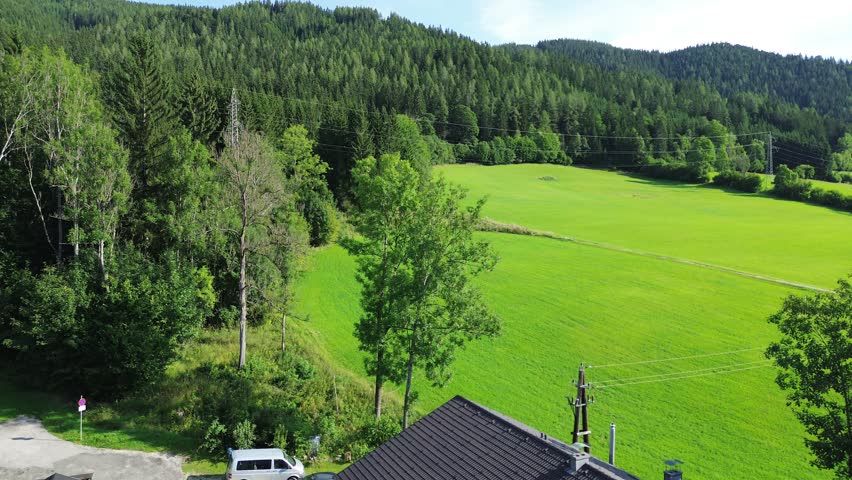 Aerial view of Steinhaus Am Semmering in Semmering, Austria close to Stuhleck, Steiermark during the summer with a drone in 4K. Sunny summer day in the forest
