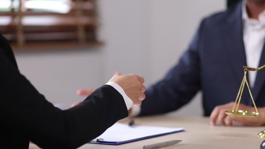 Lawyer businessmen making handshake with partner, justice and law, attorney. Royalty-Free Stock Footage #1108497407