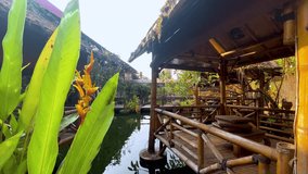 Bamboo hut on the pond. Bamboo gazebo. Beautiful garden. Calm and relaxation - Japanese concept