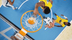 Basketball Action in a Slow Motion Replay for Sports News: Yellow Team Scores a Successful Goal, Performs a Fast Slam Dunk with One Hand. Top Down Footage From a Camera Hovering Above the Basket - Powered by Shutterstock - Get 15% off with code: PIKWIZARD15