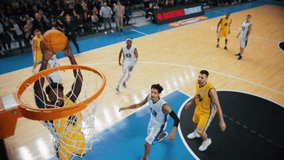 Basketball Tournament Final: Guard Player Passing the Ball to a Skillful Forward Teammate, Black Basketballer Slam Dunks the Ball and Scores Winning Points. Sports Action Slow Motion Replay - Powered by Shutterstock - Get 15% off with code: PIKWIZARD15