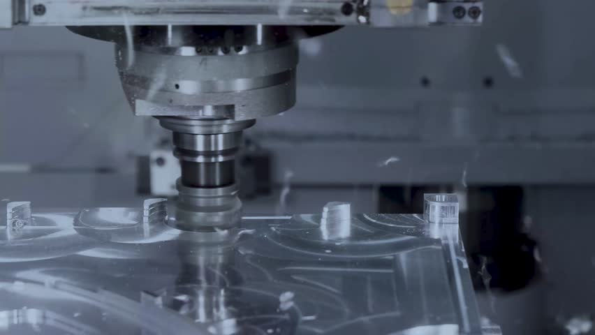 Automated Programmed CNC vertical milling machine with face mill shell endmill tool in process over aluminum metal piece, Industrial Factory 4k. Royalty-Free Stock Footage #1108500701