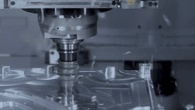 Automated Programmed CNC vertical milling machine with face mill shell endmill tool in process over aluminum metal piece, Industrial Factory 4k. - Powered by Shutterstock - Get 15% off with code: PIKWIZARD15