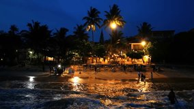 Aerial around view of beach restaurant with lights at late evening - Powered by Shutterstock - Get 15% off with code: PIKWIZARD15