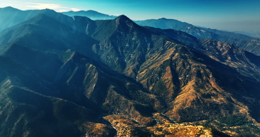 Californian rocky landscape on sunny morning. Drone footage above the rocks with poor vegetation on.