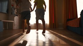 children run around the house barefoot. happy family childhood dream concept. group of little kids running around the house and playing catch-up. children have fun bare feet lifestyle close up - Powered by Shutterstock - Get 15% off with code: PIKWIZARD15
