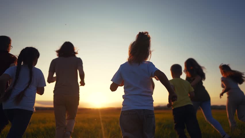 big community family run in park. silhouette of large group of people run at sunset in park in nature in summer. happy family kid dream concept. big lifestyle community kid run silhouette Royalty-Free Stock Footage #1108508483