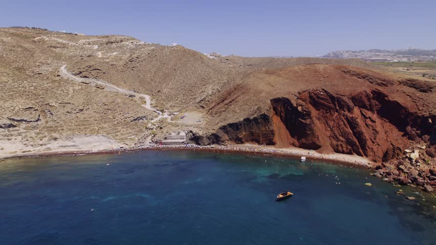 Aerial view of the iconic Red Beach, Santorini island, Cyclades, Greece. Cinematic 4k. | Shutterstock HD Video #1108526407