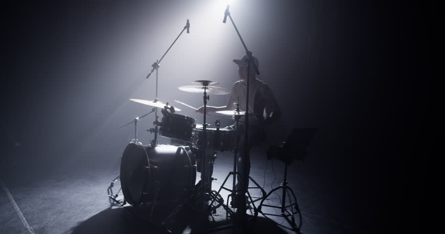 Man with drums and laptop playing music Royalty-Free Stock Footage #1108528227