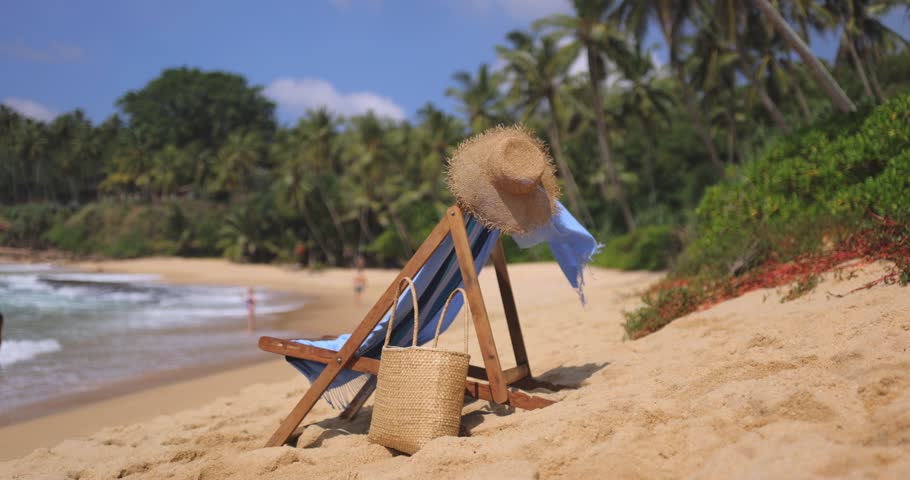 Amazing beach. Chair on the sandy beach at the sea. Luxury summer holiday and vacation resort hotel for tourism. Inspirational tropical landscape. Royalty-Free Stock Footage #1108535835