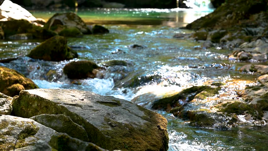 Mountain river and stones. Clean and clear water