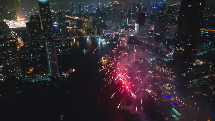 Aerial drone point of view Multi colors Fireworks Displays over the Sky City. New Year Eve. Skyscraper and Cityscape Celebrate Night Lights Royalty-Free Stock Footage #1108557143