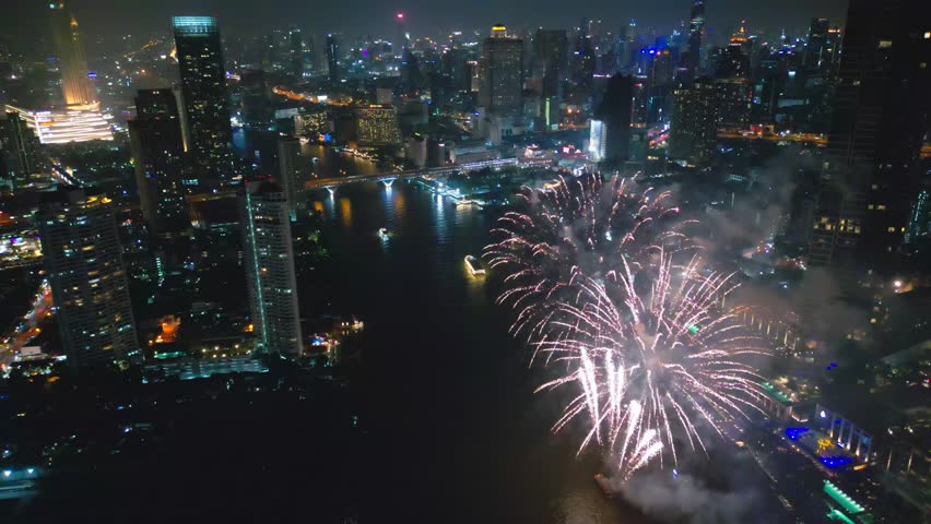 Aerial drone point of view Multi colors Fireworks Displays over the Sky City. New Year Eve. Skyscraper and Cityscape Celebrate Night Lights Royalty-Free Stock Footage #1108557149
