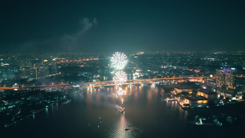 Aerial drone point of view Multi colors Fireworks Displays over the Sky City. New Year Eve. Skyscraper and Cityscape Celebrate Night Lights Royalty-Free Stock Footage #1108557151