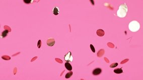 Gold Confetti Falling on Pink Background. Super Slow Motion, 1000 FPS. - Powered by Shutterstock - Get 15% off with code: PIKWIZARD15