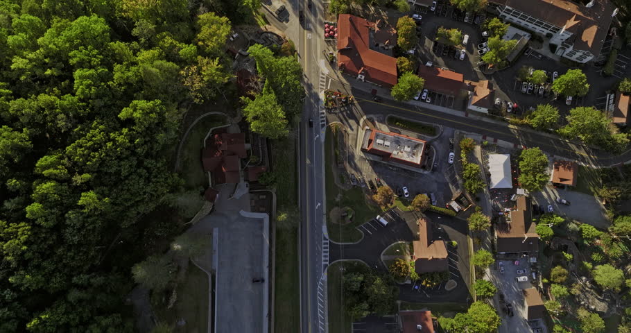Helen Georgia Aerial v13 vertical top down view, flyover above main street of the mountain town capturing Bavarian-style buildings and beautiful lush greenery - Shot with Mavic 3 Cine - October 2022