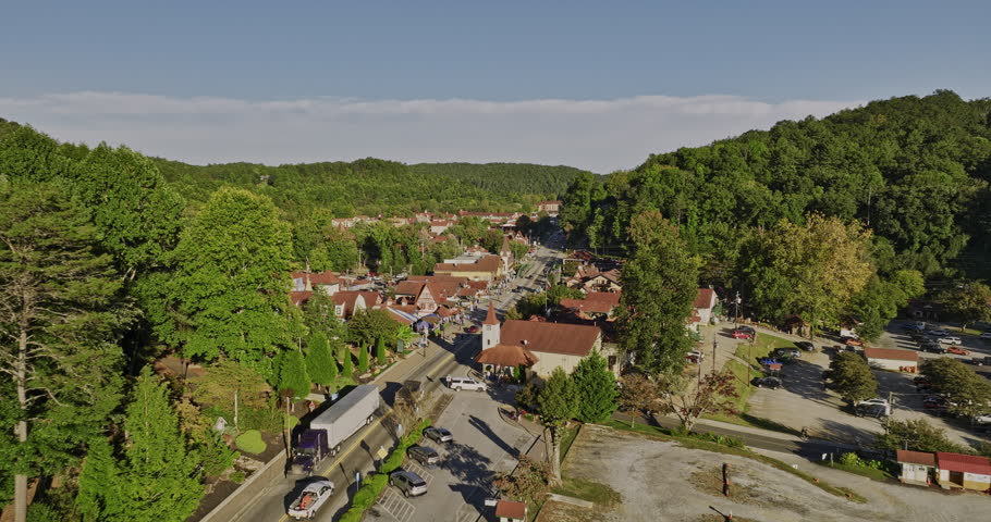 Helen Georgia Aerial v8 cinematic low drone flyover small mountain town along the main street capturing charming Bavarian-style architectures and lush greenery - Shot with Mavic 3 Cine - October 2022