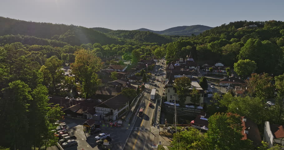 Helen Georgia Aerial v7 drone flyover mountain town along the main street capturing Bavarian-style architectures with timbered details and steep-pitched roofs - Shot with Mavic 3 Cine - October 2022