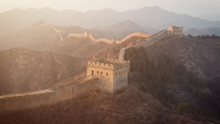 Aerial shot of the Great Wall of China at sunrise. Royalty-Free Stock Footage #1108575229