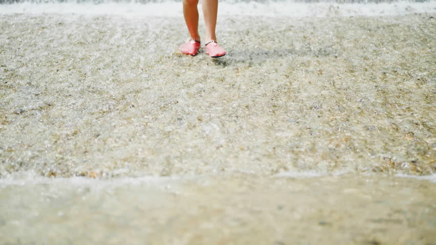 Japanese girl playing in the river