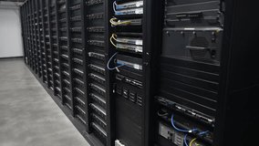 Servers like these are used for cloud computing, Data Center With Multiple Rows of Fully Operational Server Racks. - Powered by Shutterstock - Get 15% off with code: PIKWIZARD15