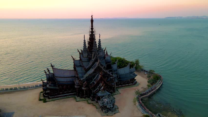 Wooden temple by the ocean Sanctuary of Truth, Pattaya, Thailand, Sanctuary of Truth pagoda during sunset Royalty-Free Stock Footage #1108580265