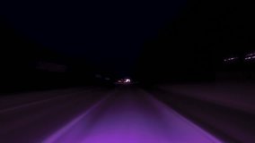 Bright Motion Timelapse of a Speedy Night Drive in a Big City, Windshield View. City Road and Glittering Streets All Turning Into Colorful Light Trails. Hyperlapse Road Trip Travel