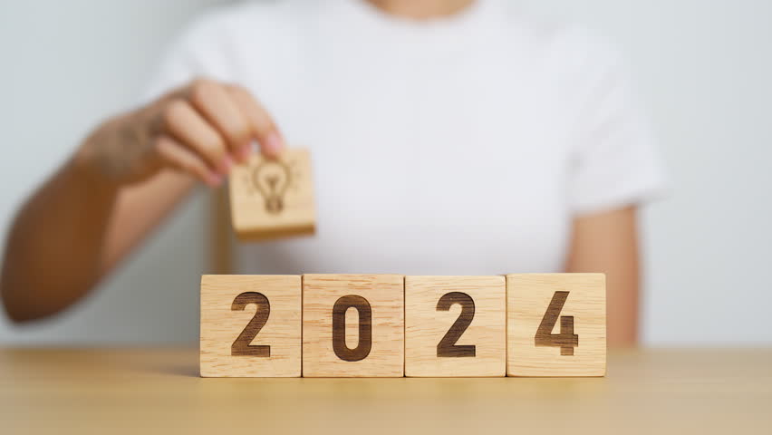 2024 wood block with business success, goal, strategy, target, mission, action, objective, teamwork, plan, idea and New Year start concept Royalty-Free Stock Footage #1108580593