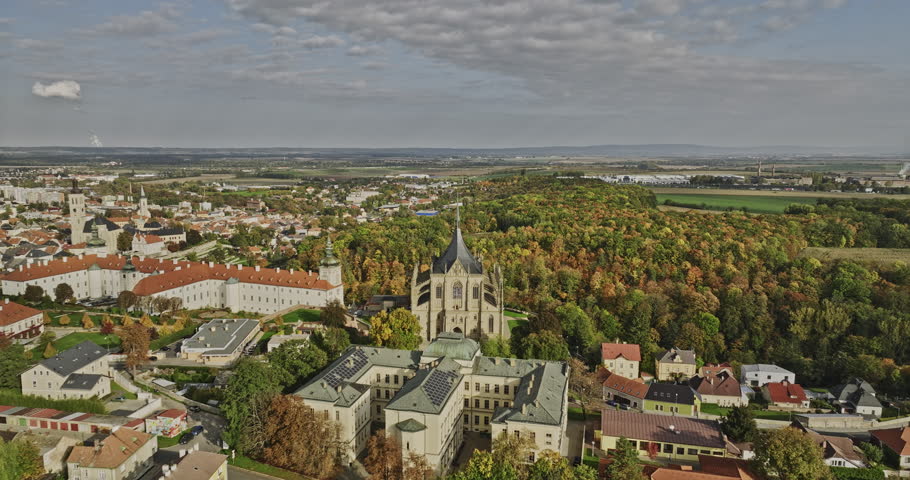 Kutna Hora Czechia Aerial v10 cinematic flyover charming old town featuring St Barbara Cathedral and Church of Saint James surrounded by hillside townscape - Shot with Mavic 3 Cine - November 2022 Royalty-Free Stock Footage #1108604929