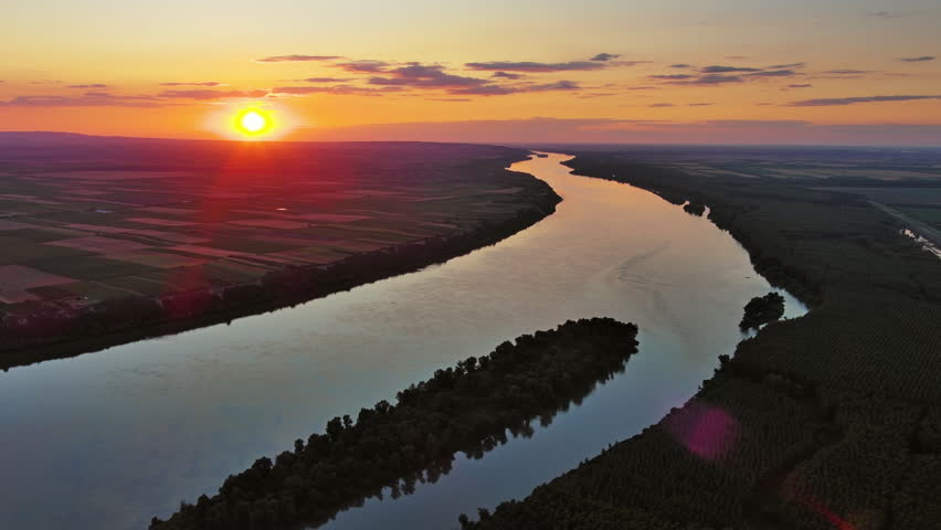 Aerial view landscape with beautiful sunset on Danube river, 4k