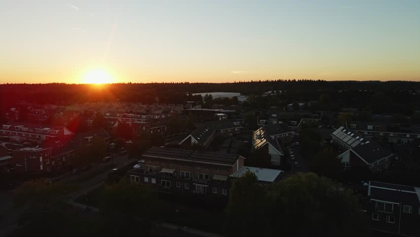 Jib up of a beautiful suburban neighborhood at sunset Royalty-Free Stock Footage #1108611239