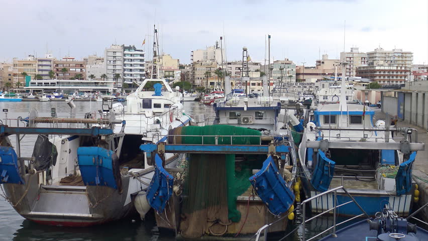 ALTEA, SPAIN – FEBRUARY 15, 2023. Trawler fishing boatS docked in the port of Altea, Spain.