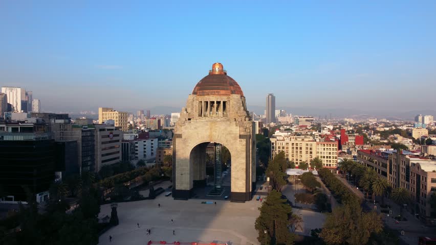 Aerial view of the Monumento a la Revolucion at sunset in Mexico City Royalty-Free Stock Footage #1108615387