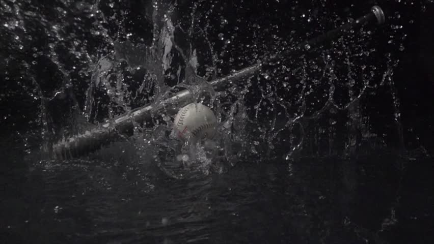 Super Slow Motion Shot of baseball ball and bat at 1000 fps. Waterfall at 1000 frames per second. Sport concept super slow motion shot on high speed camera 1000 fps. 