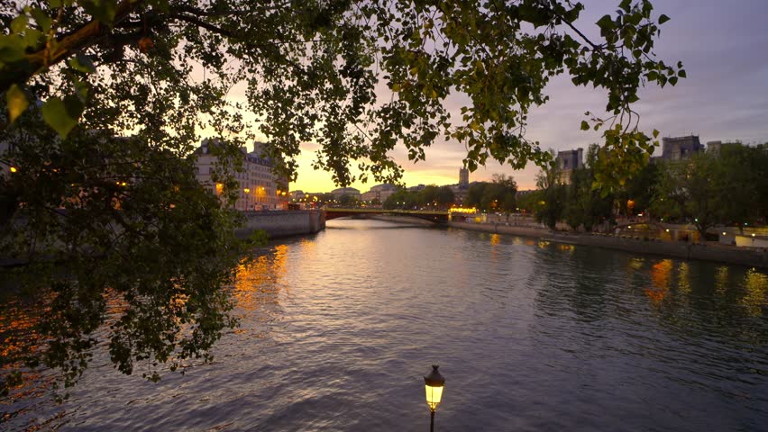 Wonderful evening view over River Seine in Paris - travel photography in Paris France Royalty-Free Stock Footage #1108619665