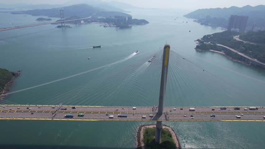 Drone Aerial Skyview in Highway Flyover Traffic on Ma Wan Sham Tseng Tsuen Wan Tsing Yi Tuen Mun Road Hong Kong Tsing Ma suspension Bridge, Ting Kau bridge