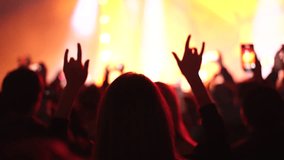 Fun woman show rock n roll gesture. Heavy metal hand up sign. Hip hop live music concert. Cool people hang out dance party. Joy fan chill open air rave fest. Girl enjoy epic disco song Night club life - Powered by Shutterstock - Get 15% off with code: PIKWIZARD15