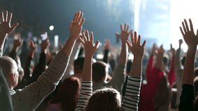 Many joy people raise hands up into sky. Fun live music concert. Sectarians crowd pray god. Lot sect fans follow faith. Holy worship concept. Epic rite open air. Big group lift arms. Huge ritual cults - Powered by Shutterstock - Get 15% off with code: PIKWIZARD15