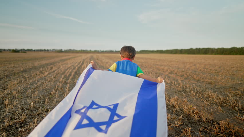 Happy Israeli Jewish little cute boy running with Israel national flag. Independence Day. Patriotism Royalty-Free Stock Footage #1108641069