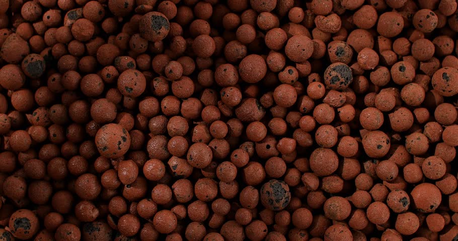 Clay pebbles, expanded clay, weed protection, ornamental value, orchard and garden substrates. High quality 4k footage | Shutterstock HD Video #1108657089