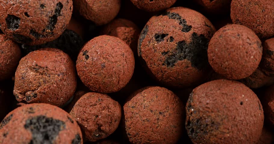 Clay pebbles, expanded clay, weed protection, ornamental value, orchard and garden substrates. High quality 4k footage | Shutterstock HD Video #1108657091