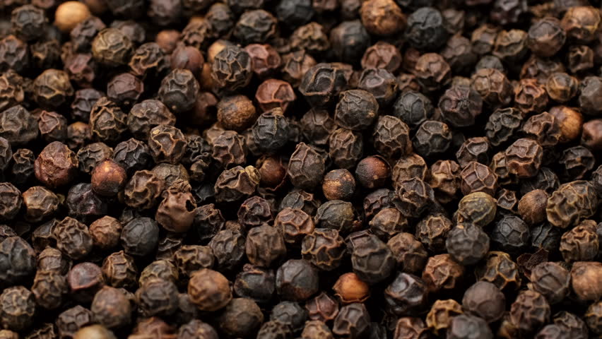 Zoom frame dried black peppercorns, rotation