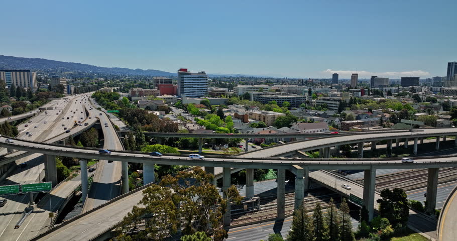 Oakland California Aerial v9 drone flyover elevated interstate highway capturing inner city suburb pill hill neighborhood and downtown cityscape in the background - Shot with Mavic 3 Cine - April 2022 Royalty-Free Stock Footage #1108662721