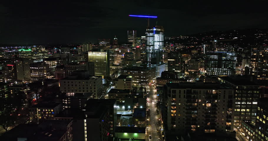 Portland Oregon Aerial v113 flyover downtown from Pearl District capturing urban downtown cityscape with shimmering exterior of high rise buildings at night - Shot with Mavic 3 Cine - August 2022