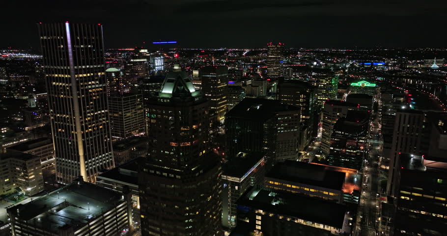 Portland Oregon Aerial v116 cinematic drone flyover lively downtown capturing illuminated night cityscape with shimmering exterior of skyscrapers and buildings - Shot with Mavic 3 Cine - August 2022 Royalty-Free Stock Footage #1108662811